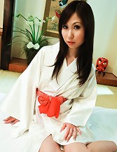 Karen is a gorgeous Japanese babe that loves her big tits fondled
