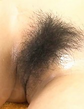 Hinano Asian with oiled body gets vibrators on vagina and boobs